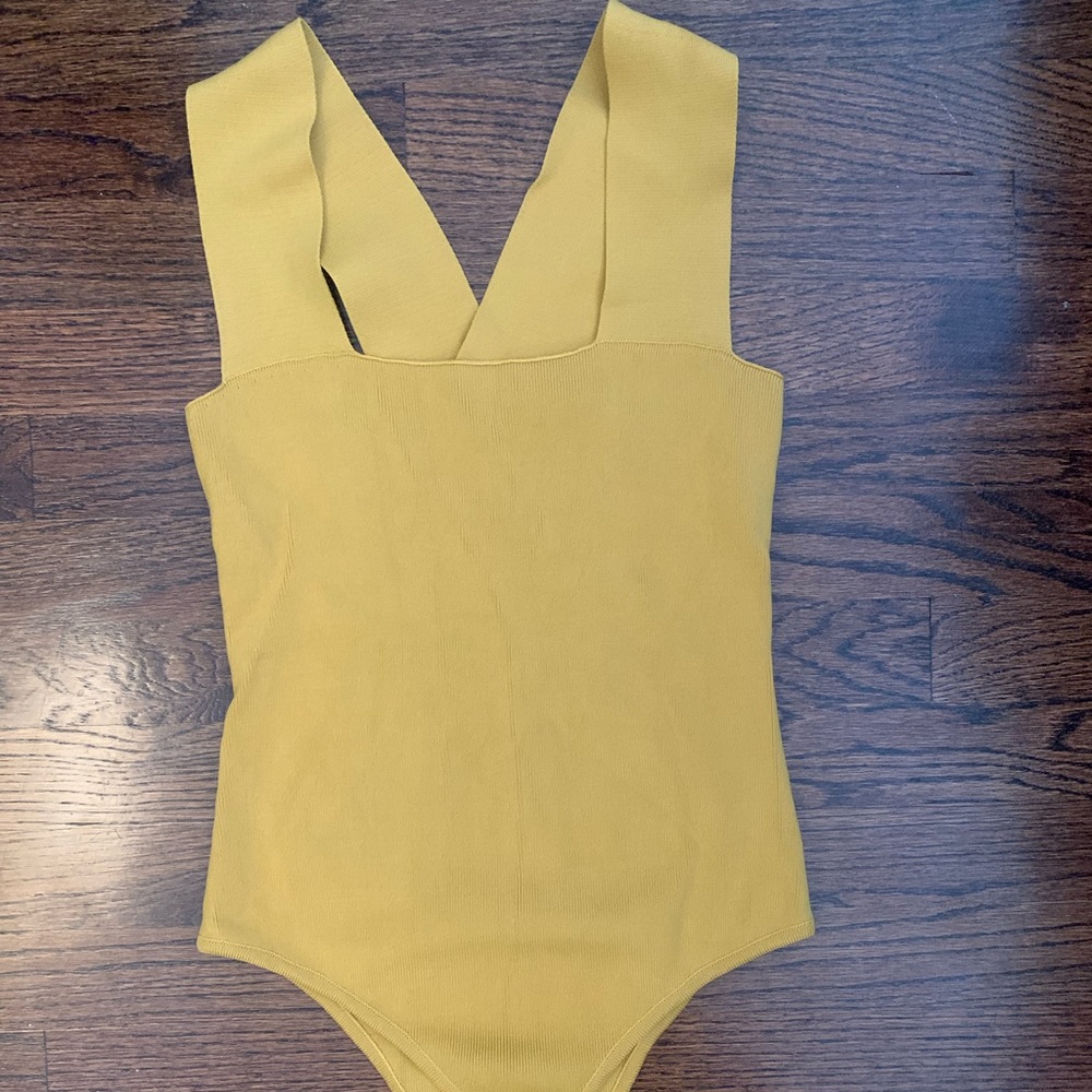 Yellow body suit